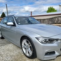 Silver BMW washed and detailed
